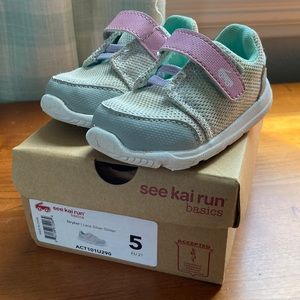 See Kai Run basics Stryker sneakers in “Lace Silver Glitter”